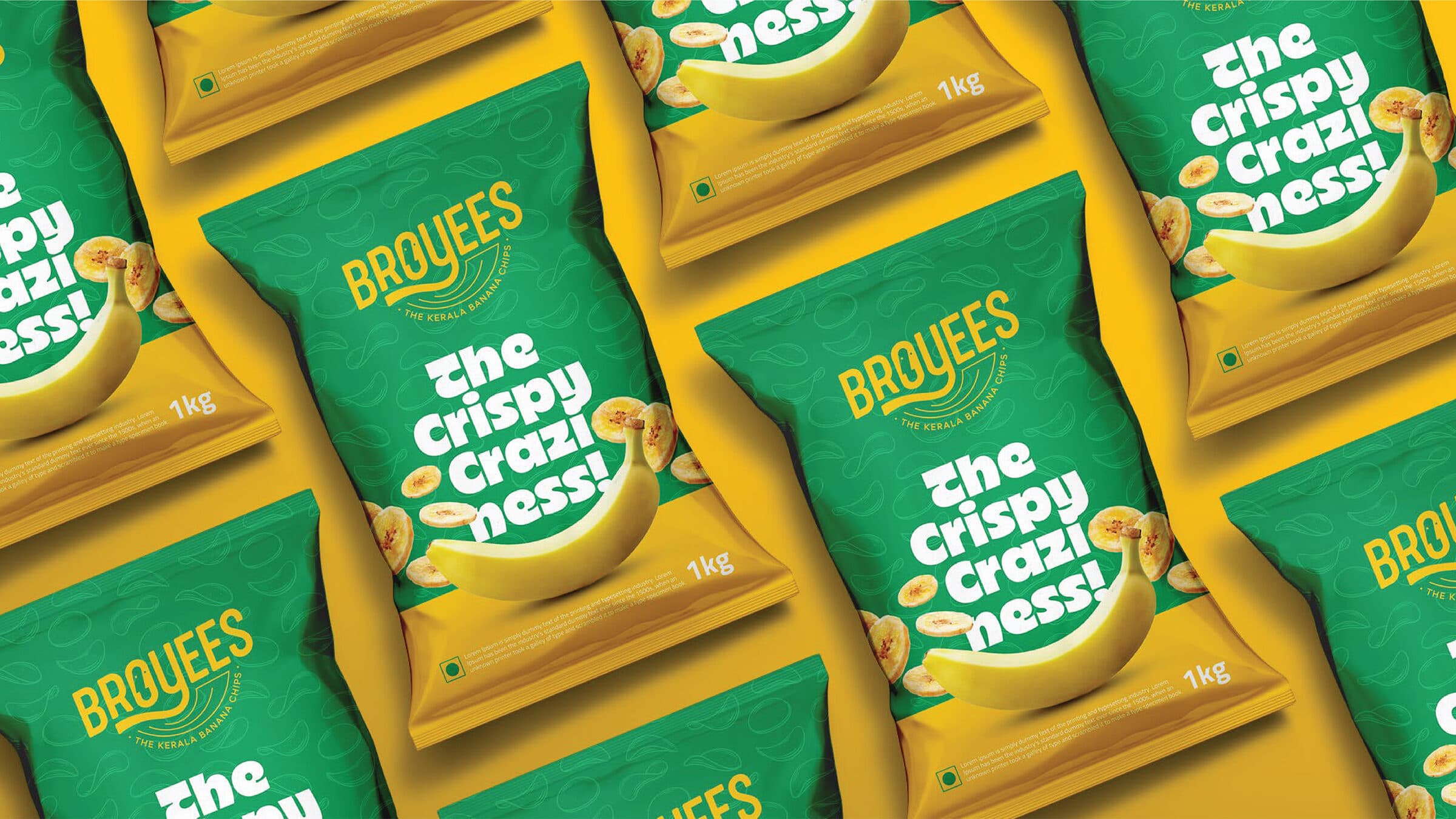 Broyees 1kg banana chips packaging mockup — green and yellow alternating bags arranged in a flat lay with The Crispy Craziness on the front